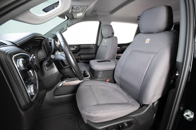Covercraft Carhartt PrecisionFit second row seat covers installed in a Toyota Grand Highlander, showcasing durable, tailored vehicle protection.