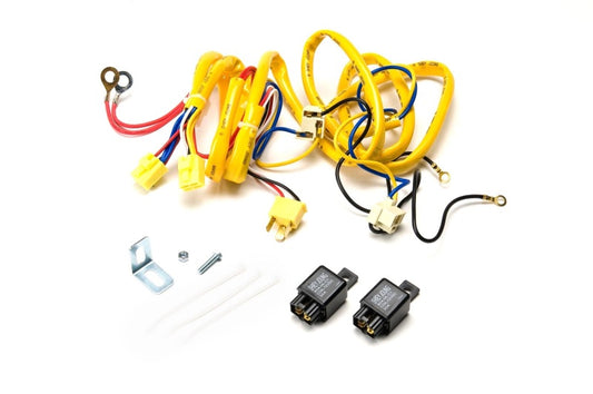 Putco H4 100W heavy-duty wiring harness with relay for vehicle headlights, designed for durable and reliable light accessory installation.