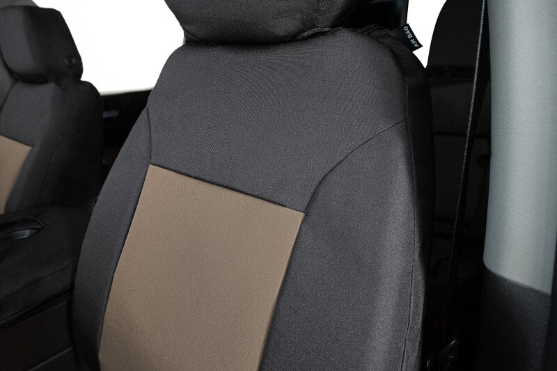 Covercraft Ford Super Endura PrecisionFit custom front seat covers in tan and black, designed for 2023-2024 Ford trucks.