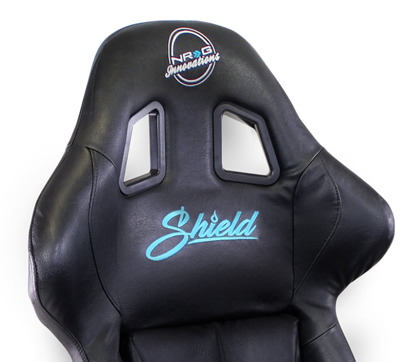 NRG FIA competition race seat with black competition fabric, FIA homologation, and water-resistant features, designed for racing vehicles.