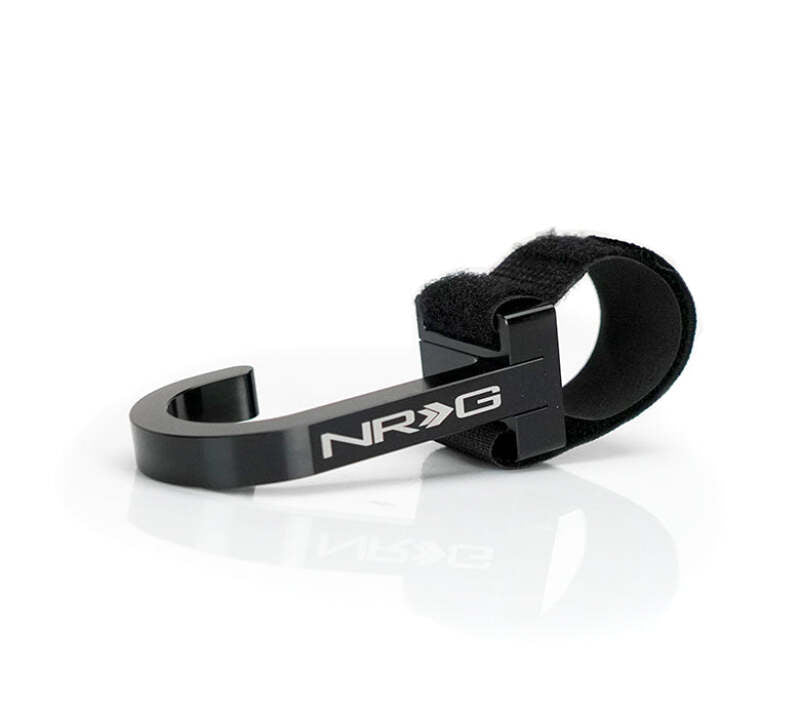 NRG CNC aluminum steering wheel hook with laser logo, black finish, designed for secure attachment in racing or car interior.