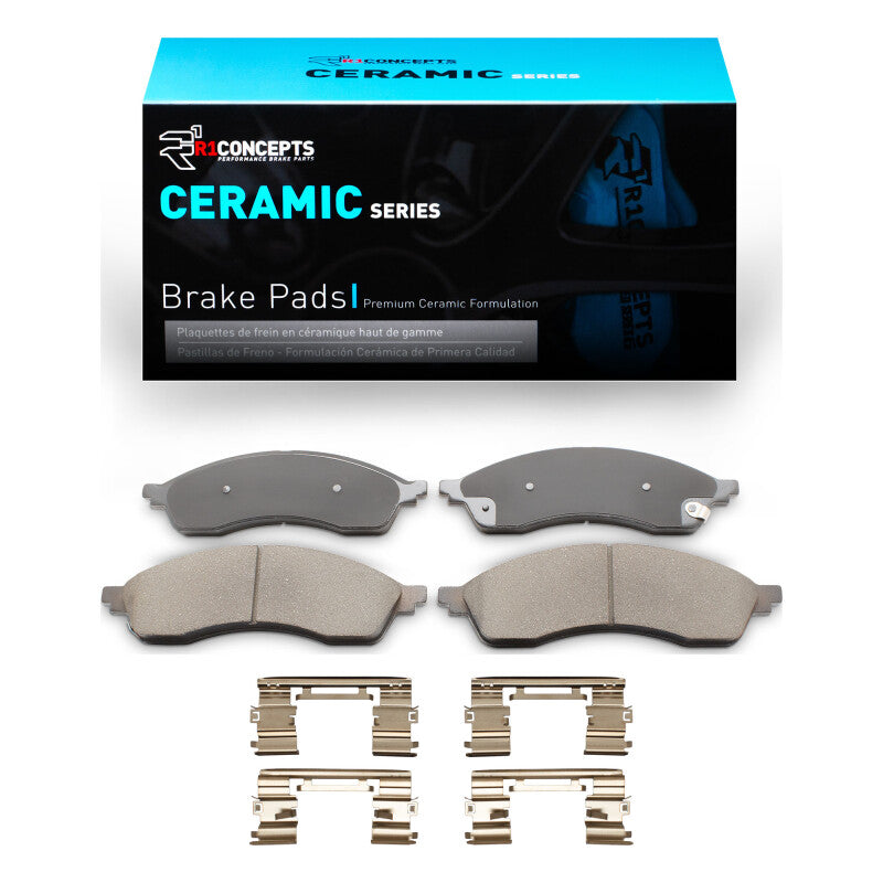 R1 Concepts OE ceramic brake pads and hardware kit for Ford Edge 2021-2024 front brake system, shown with hardware components.