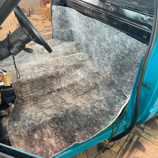 DEI Under Capet Lite thermal wrap in 48x70 inches, 23.3 sq ft, shown installed under carpet for insulation and heat retention.