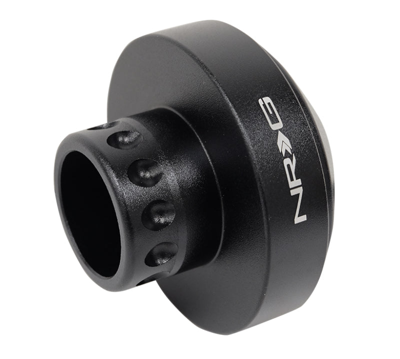 NRG Can Am Maverick X3 short spline steering wheel hub adapter showing black metal hub with mounting holes and spline connection