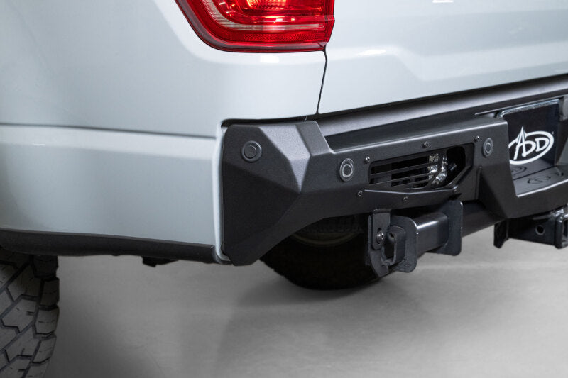 Addictive Desert Designs steel rear bumper for 2021-2023 Ford F-150 Bomber model, rugged off-road bumper with durable steel construction.