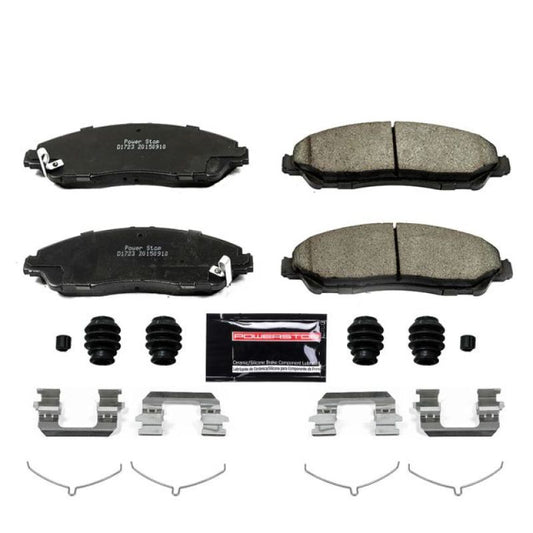 PowerStop Z23 Evolution Sport brake pads with hardware installed on front of 2014-2017 Acura MDX, performance replacement brake components