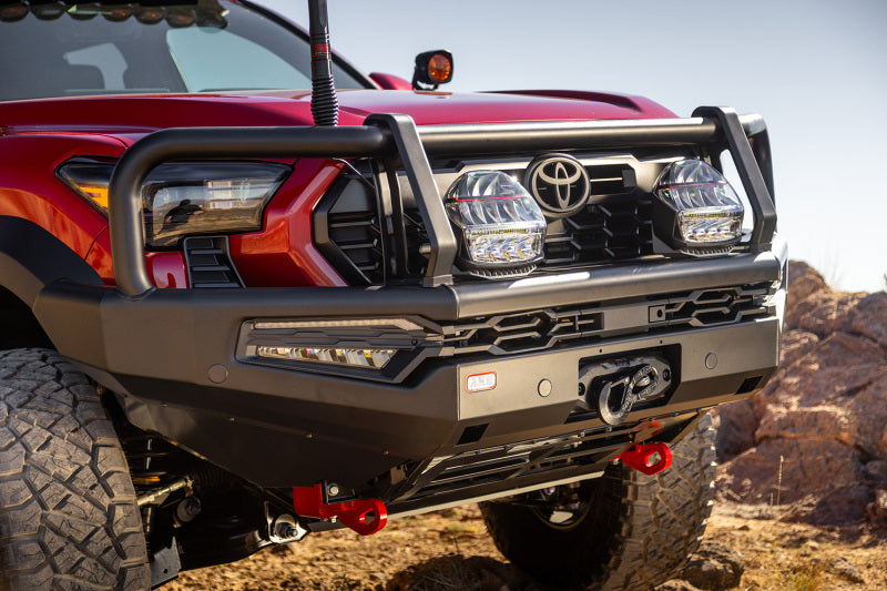 ARB Summit MKII Combar Winch Bumper bull bar installed on a 2024+ Toyota Tacoma, showcasing rugged off-road protection and stylish design.