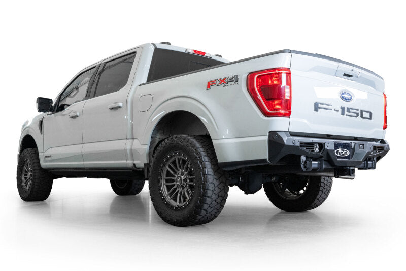 Addictive Desert Designs steel bomber rear bumper for 2021-2023 Ford F-150, rugged off-road truck bumper with durable steel construction.