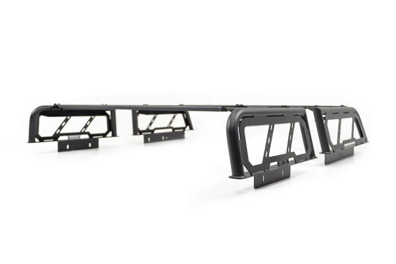 DV8 Offroad MTO Series bed rack for Toyota Tundra and Ford F150 Raptor, two-piece adjustable exterior truck bed accessory.