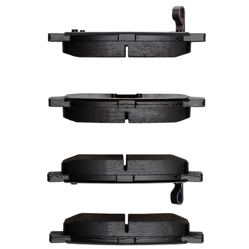 Hyundai Elantra R1 Concepts OE rear brake pads with orange friction material and metal backing plates, designed for optimal braking performance.
