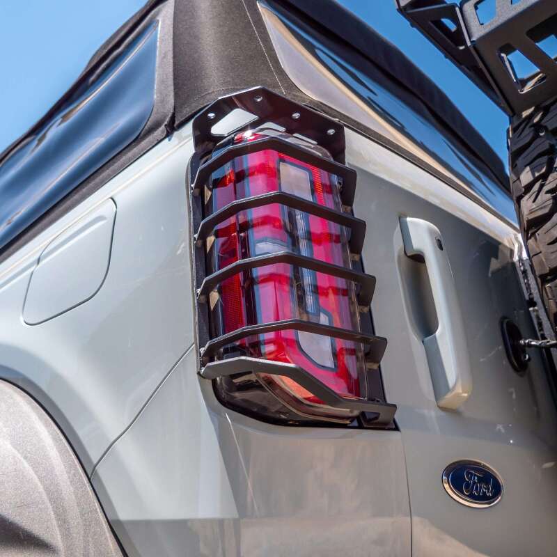 TURN Offroad 2021+ Ford Bronco rear tail light guards, durable metal protectors for off-road tail lights, black finish.
