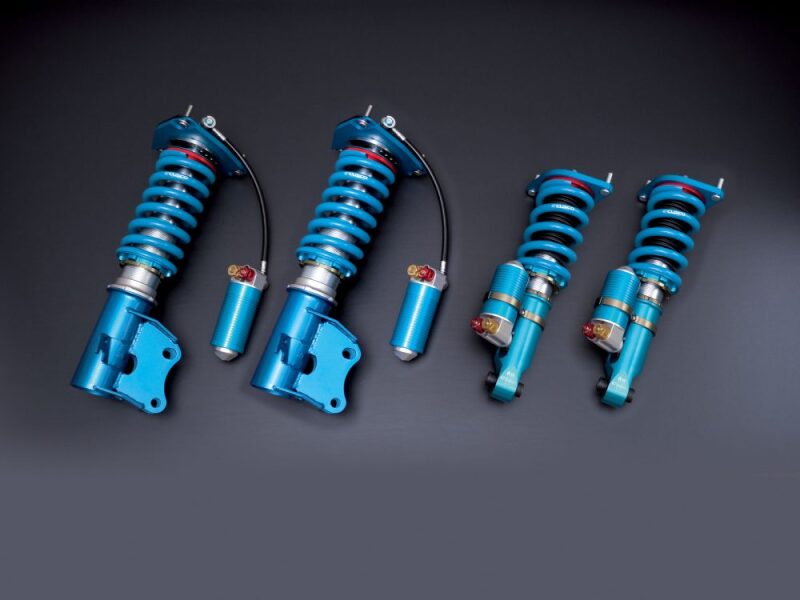 Cusco Sport X coilover pillowball mounts for Mitsubishi Evo 5/6 CP9A, featuring front and rear mounts with 11K/10K spring rates.