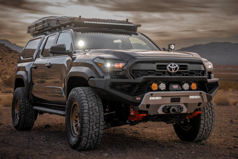 ARB 2024+ Toyota Tacoma Zenith Winch Bar bull bar in TXT black, showing the rugged steel design and mounting points for off-road protection.