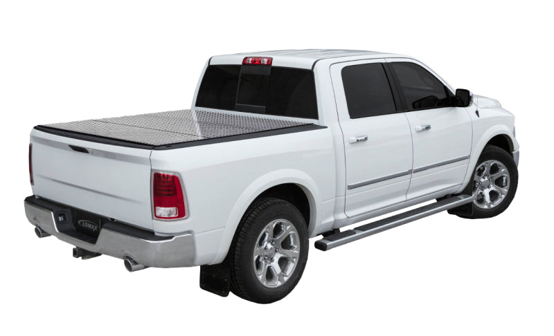 Black diamond mist Access LOMAX tri-fold truck bed cover on a 2019 Dodge Ram 1500 5ft 7in bed, exterior truck bed accessory.