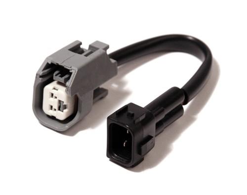 Set of four BLOX Racing Bosch to OBD1 fuel injector harness connectors for efficient engine wiring.