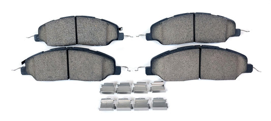 Baer Brakes performance Claw brake pads installed on a 2011-2014 Ford Mustang, showing the brake pad design and branding.
