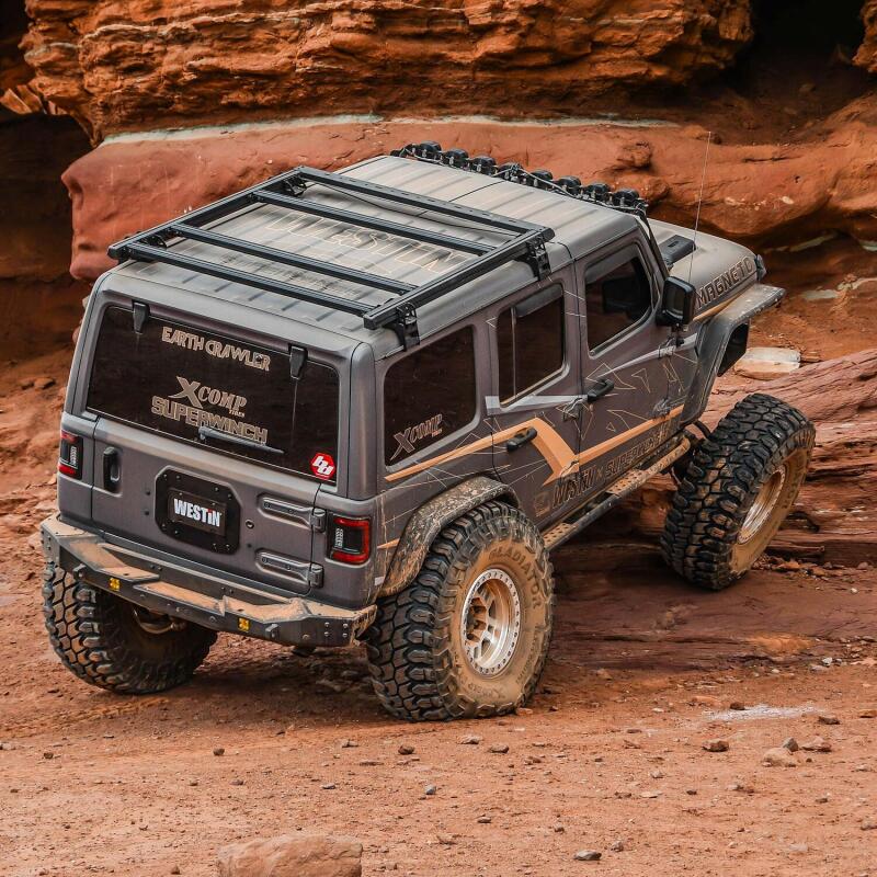 Westin Jeep Wrangler JL Unlimited Mesa Roof Rack mounted on vehicle, showcasing durable black steel construction and crossbar design.