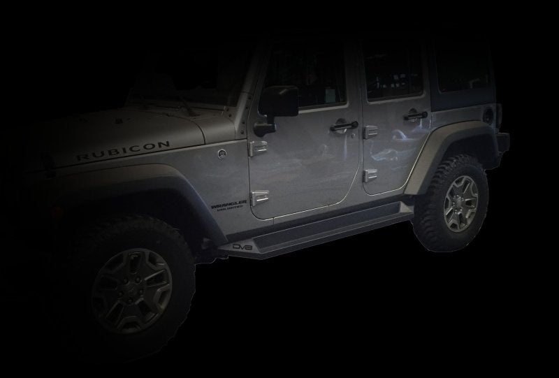 DV8 Offroad steel rock slider side steps for 2007-2018 Jeep Wrangler JK in matte black, designed for 4-door models.