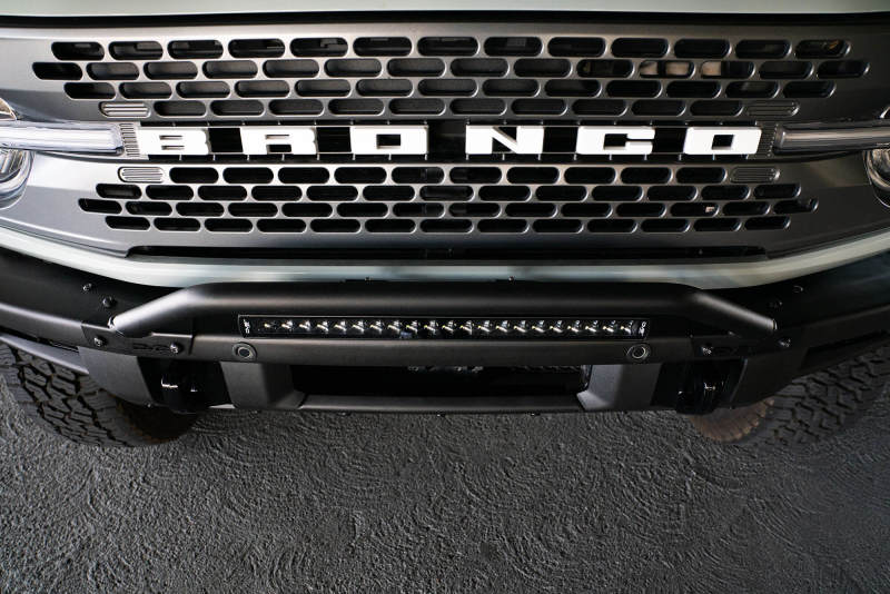 DV8 Offroad black light mounts for 2021-2022 Ford Bronco factory bumper bull bar, designed for off-road vehicle lighting.