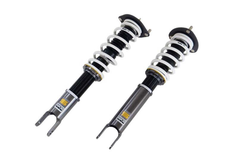 HKS Hipermax S ND5RC coilover kit installed on a vehicle, showcasing adjustable suspension components with a sleek design.
