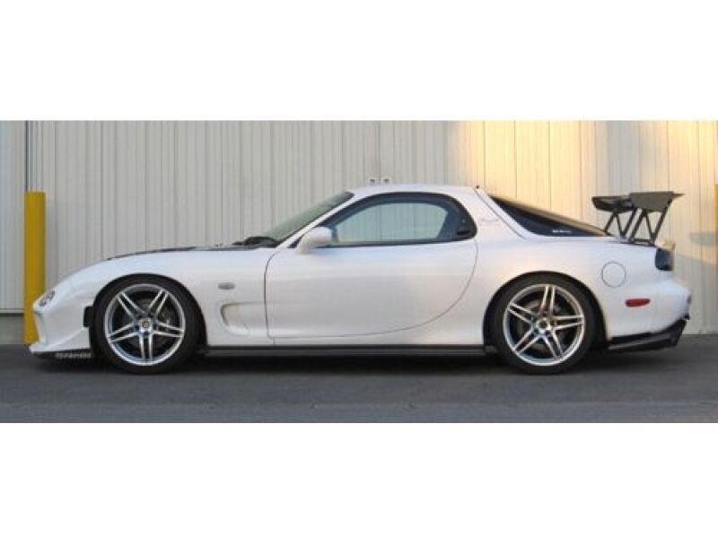 HKS Hipermax R FD3S coilovers installed on a Mazda RX-7 for improved suspension and handling.