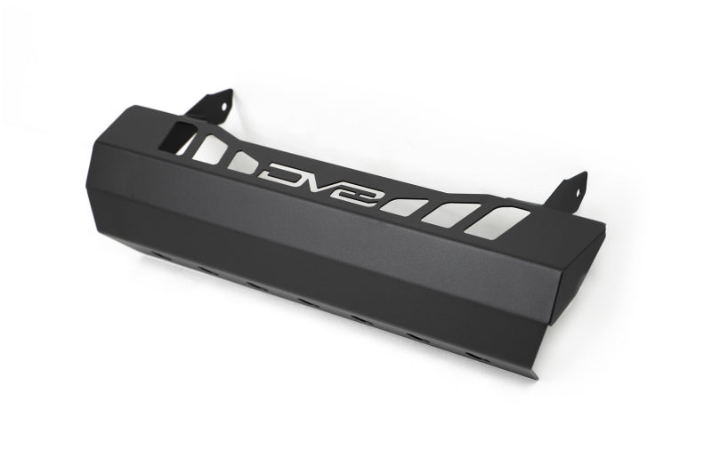 DV8 Offroad Jeep Wrangler JL/JT front bumper sway-bar disconnect motor skid plate on rugged off-road vehicle.