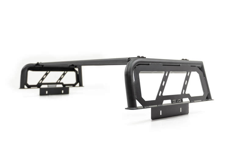 DV8 Offroad MTO Series 2-piece adjustable bed rack mounted on Toyota Tundra and Ford F150 Raptor trucks, exterior truck bed accessory