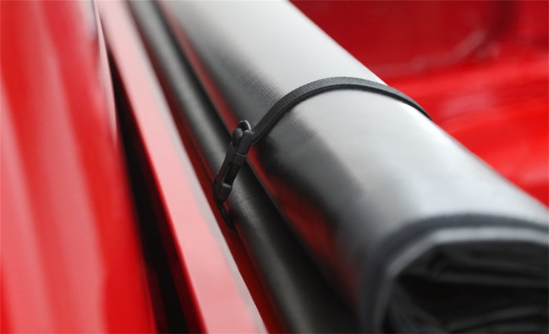 Access Tonnosport roll-up truck bed cover on Dodge Ram 1500 quad and regular cab with 8ft bed, exterior truck bed accessory.
