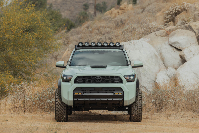 DV8 Offroad Toyota 4Runner exterior window Molle panel for DV8 roof rack on driver side, part of exterior trim accessory.