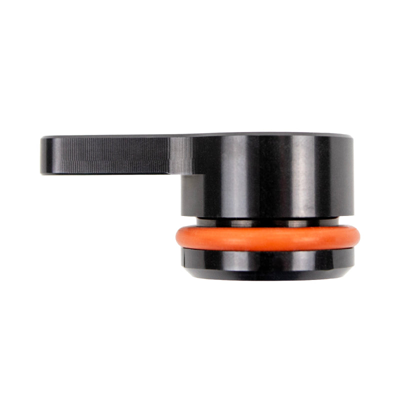 Wehrli Duramax coolant bypass kit with a coolant plug, designed for engine cooling system installation and maintenance.