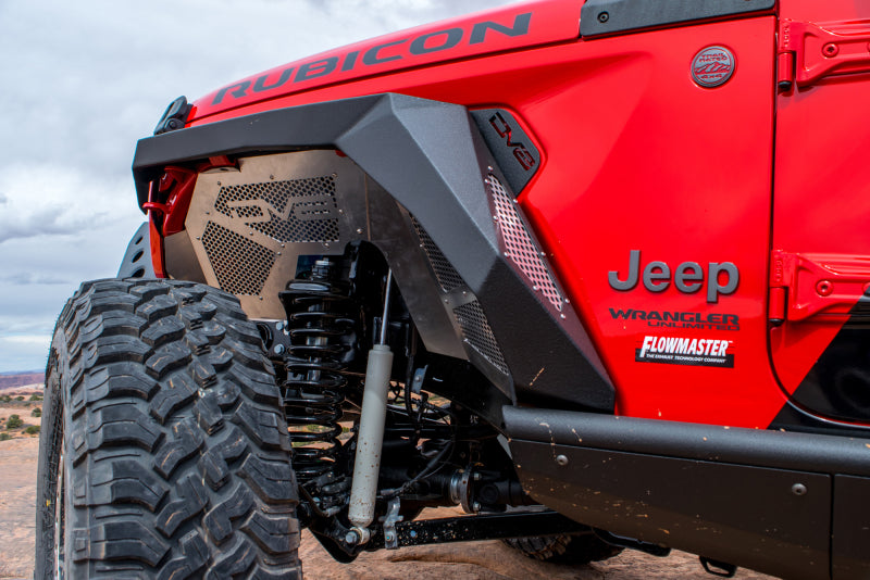 DV8 Offroad Jeep Wrangler JL armor fenders with integrated LED turn signal lights on black rugged fender extensions.