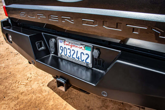 Steel rear bumper for Ford F250/F350 SD, ICON 17-22 Pro series, rugged steel construction with mounting details visible.