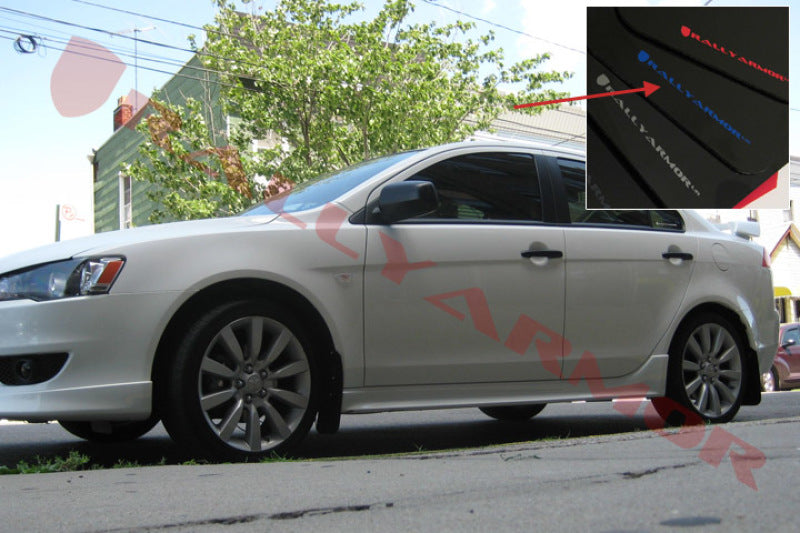 Rally Armor black mud flaps with blue logo installed on a 2007-2017 Mitsubishi Lancer, showing the durable plastic design.