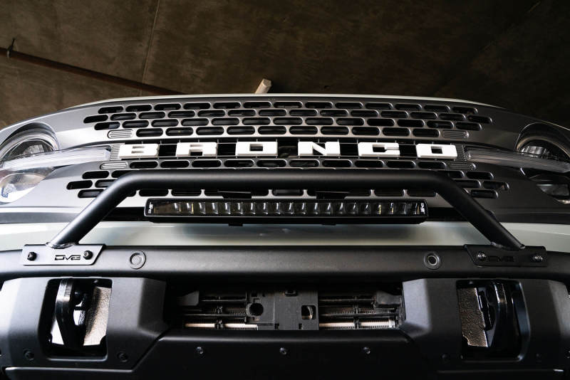 DV8 Offroad black light mounts for 2021-2022 Ford Bronco factory bumper bull bar, designed for offroad vehicle lighting.