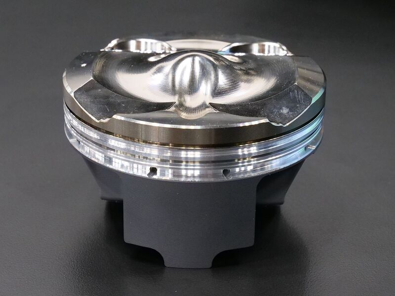 HKS forged piston set for G16E engine, four-cylinder high-performance BCD Piston Kit with D87.5 dimensions, close-up view