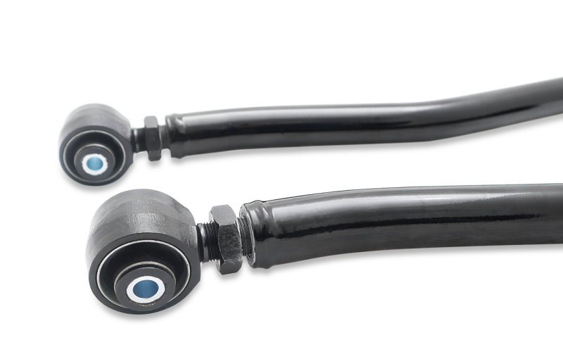 SuperPro lower trailing arm set for Jeep Wrangler JK 2007-2018, showing suspension arm bushings in a clean, detailed image