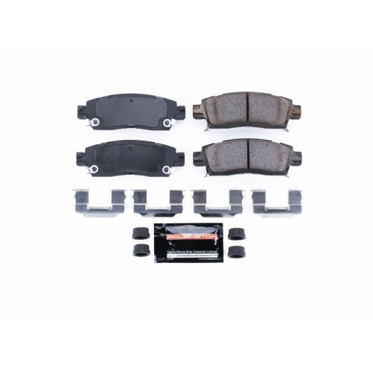 PowerStop Z23 Evolution Sport rear brake pads with hardware installed on a Buick Enclave, showcasing high-performance brake components.