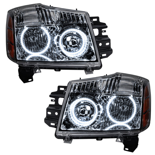 Oracle white Nissan Armada headlights with SMD LED daytime running lights, designed for models 2008-2015, by Oracle Lighting.