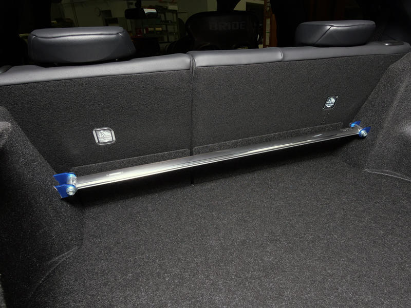 Cusco rear strut tower brace installed on 2020+ Toyota Yaris and GR Yaris chassis for improved stability and handling.