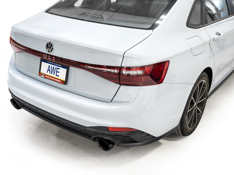 AWE Tuning catback exhaust with diamond black tips installed on a 2022-2025 Volkswagen Jetta GLI Track Edition.