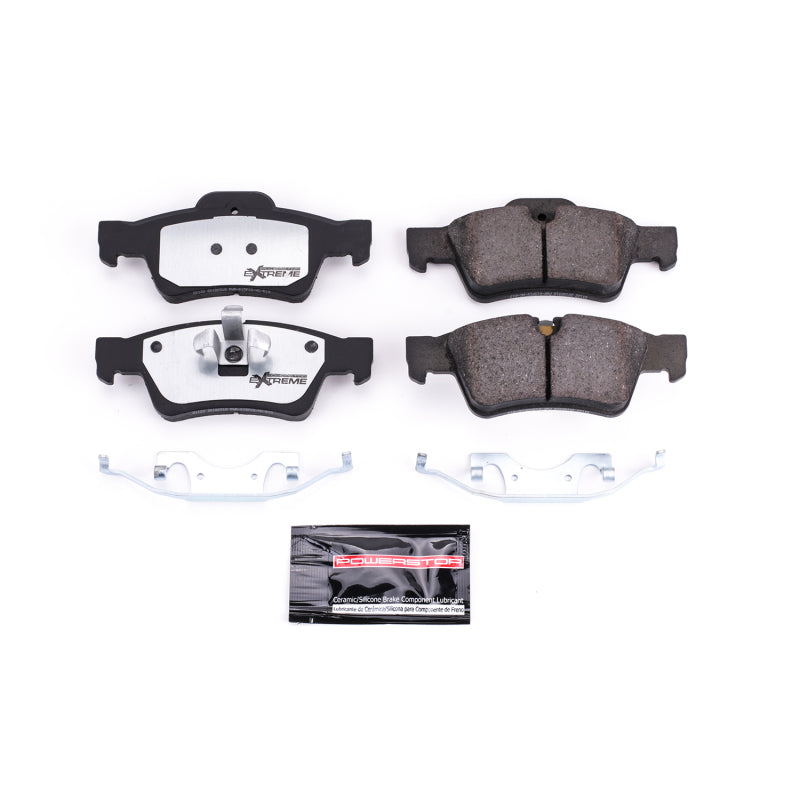 PowerStop Z26 Extreme Street rear brake pads with hardware for 2011 Mercedes-Benz G55 AMG, performance brake pads with metal backing plates.