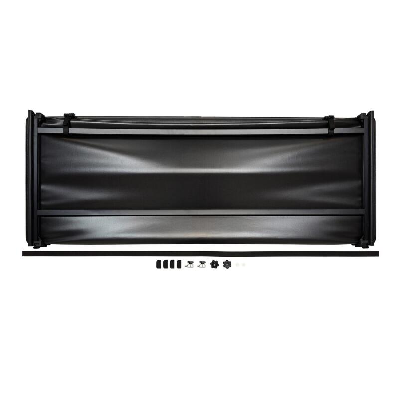 Westin 2024+ Toyota Tacoma 74-inch bed soft tri-fold tonneau cover installed on truck bed, protects cargo from weather.