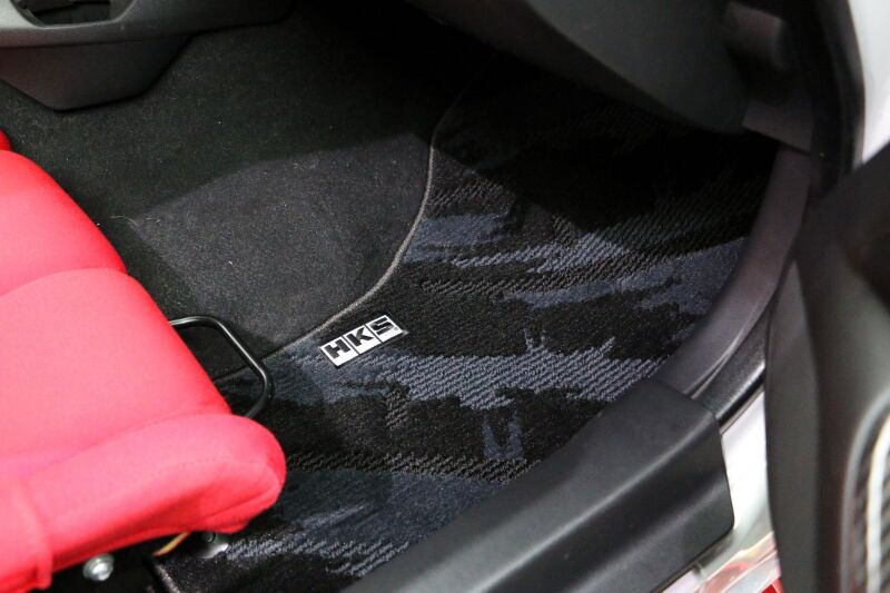 HKS carpeted floor mats full set for Nissan ND with oct LHD vehicle, showing black textured design and fitment details