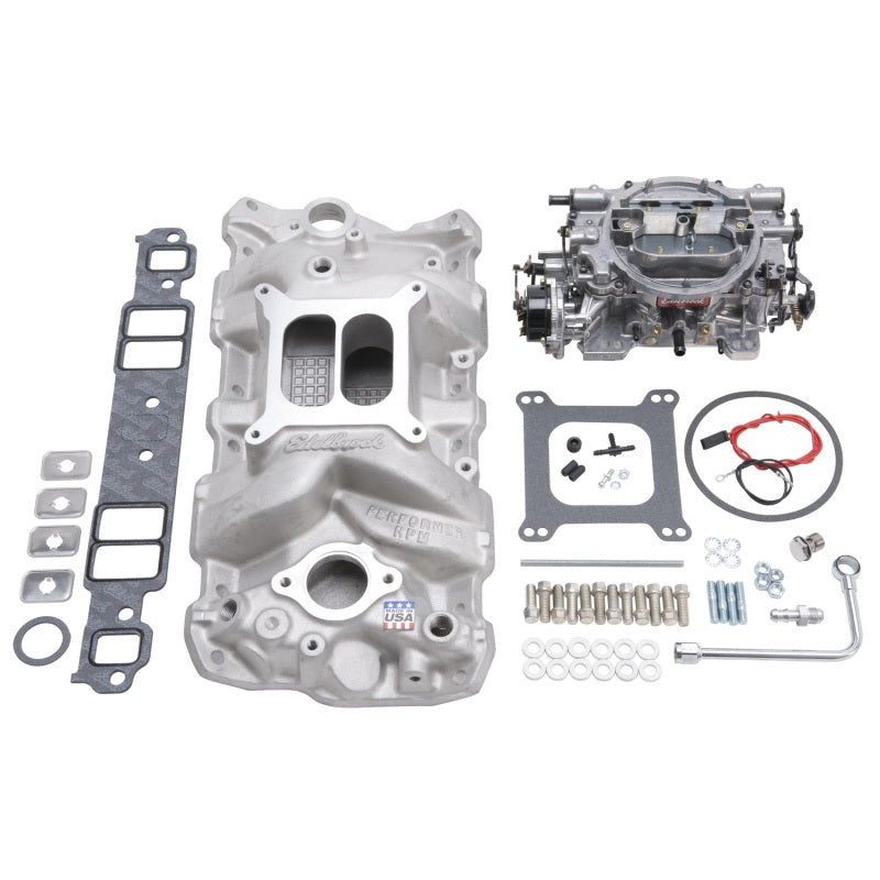 Edelbrock Performer RPM small block Chevrolet intake manifold and carb kit in natural finish for 1957-1986 engines.