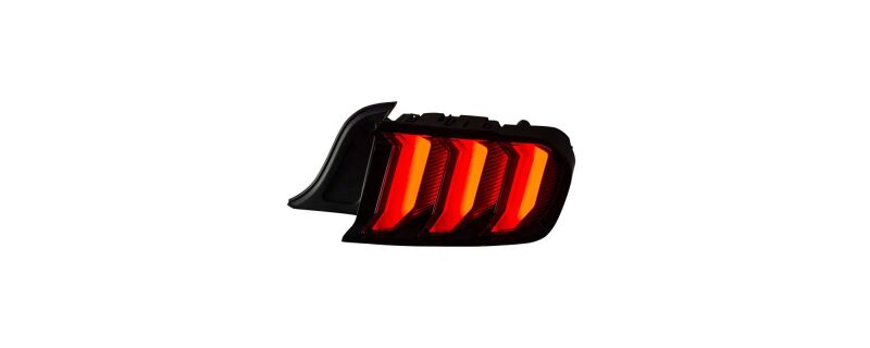 Raxiom Ford Mustang Euro style LED tail lights with gloss black housing and red lenses, designed for 2015-2023 models.