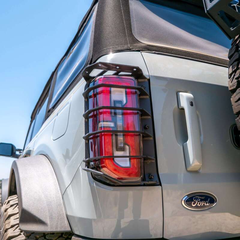 TURN Offroad 2021+ Ford Bronco rear tail light guards, durable protective covers for tail lights, shown installed on vehicle.
