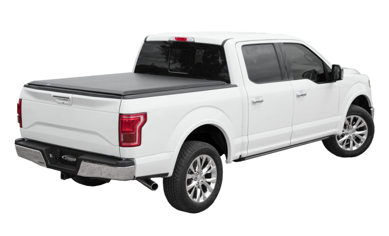 Access Literider 01-06 Ford Explorer Sport Trac 4ft 2in bed roll-up cover installed on truck bed, bolt-on exterior accessory.