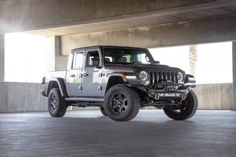 Steel front bumper for Jeep Wrangler JK, JL, and Gladiator JT from DV8 Offroad's MTO Series, featuring rugged off-road design.