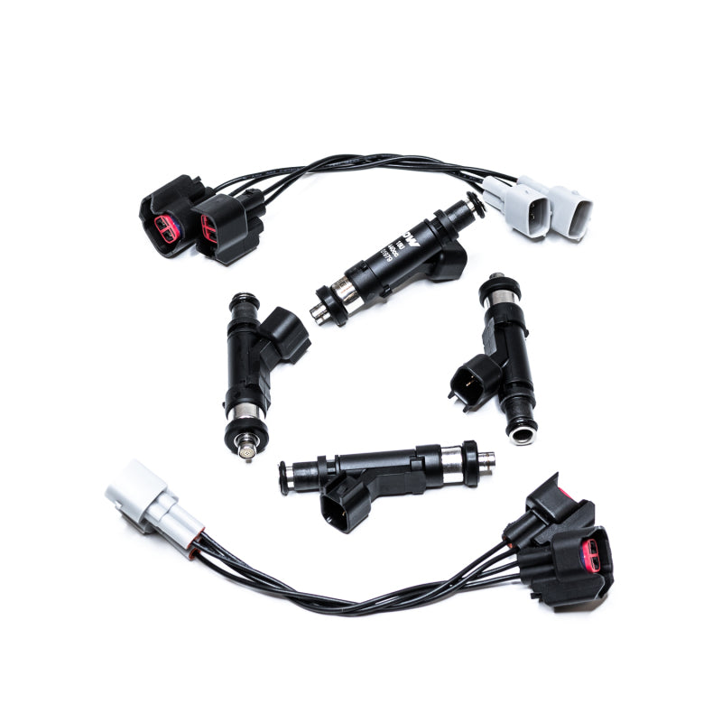 DeatschWerks 05+ Elise and Toyota fuel injector set with four 440CC 4-cylinder injectors, showcasing the metallic components.