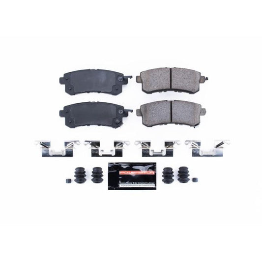 PowerStop Z23 Evolution Sport rear brake pads with hardware for Infiniti QX56 2011-2013, shown installed on vehicle.